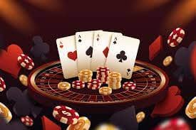 Live Caribbean Stud Poker table with dealer and cards